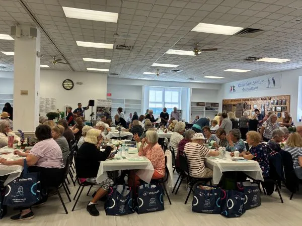 Tracey Twarog and agents helping seniors at the Rotterdam Senior Center